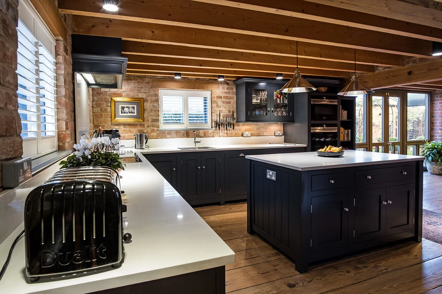 Handmade kitchen with dark painted island